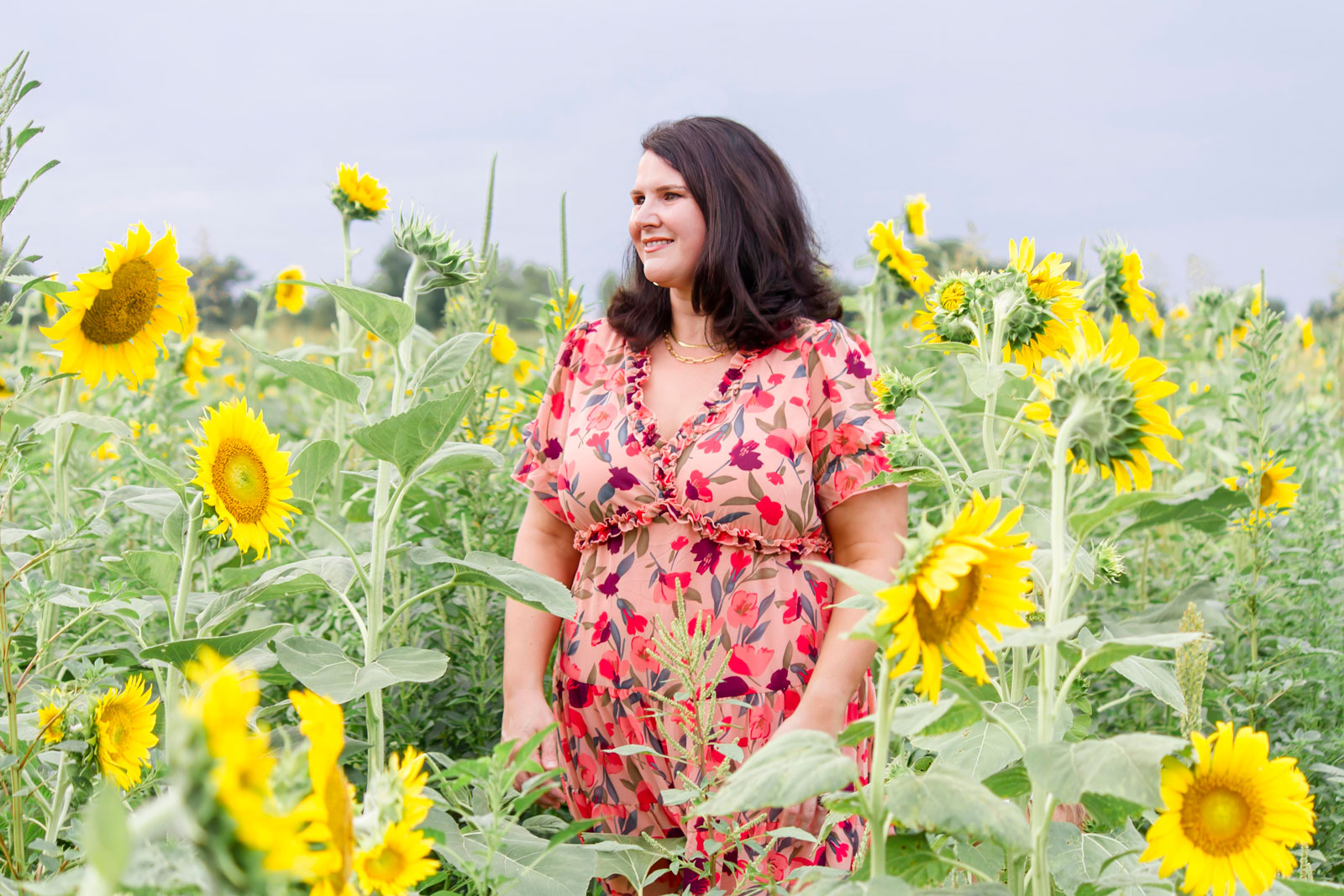 Mom in the field of sunflowers at the sunflower field in Belcher LA