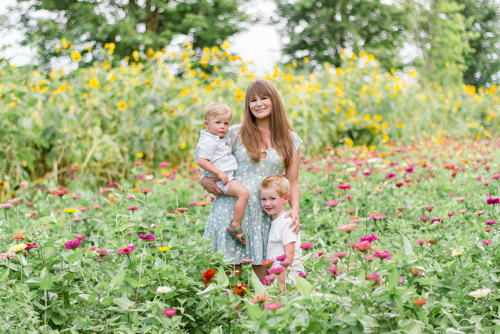 Mom with her two youngest children in the wildflower field in Belcher, LA