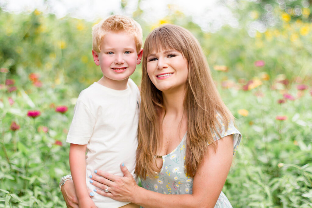 Mom with her middle child in the wildflower field in Belcher, LA