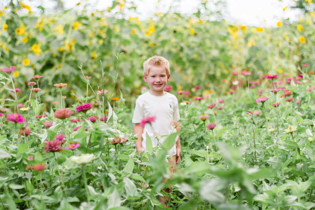 Little boy in the wildflower field in Belcher, LA