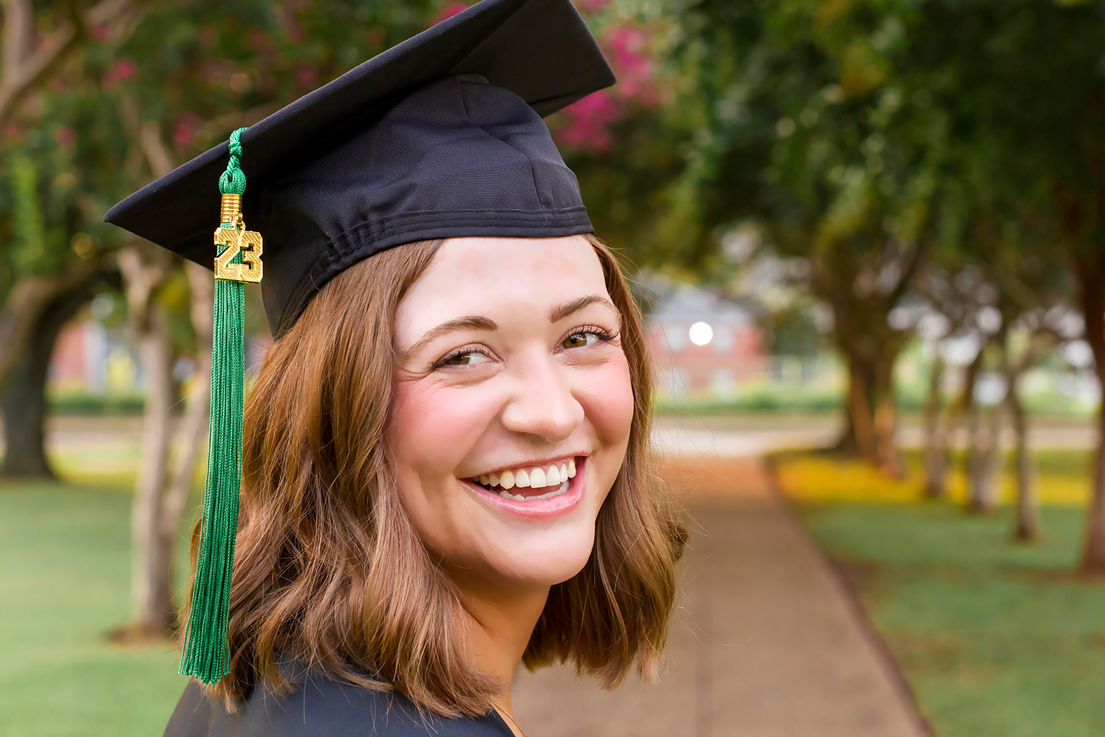 college grad med senior smiling on LSUS campus Shreveport LA