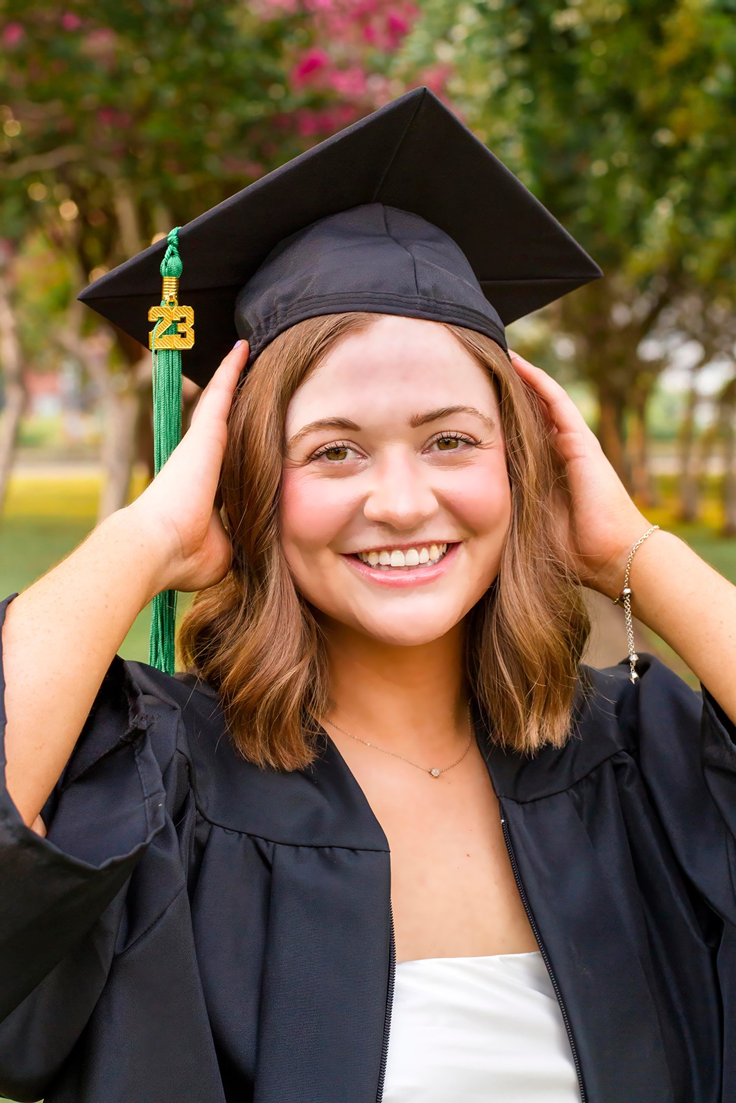 college grad med senior smiling on LSUS campus Shreveport LA