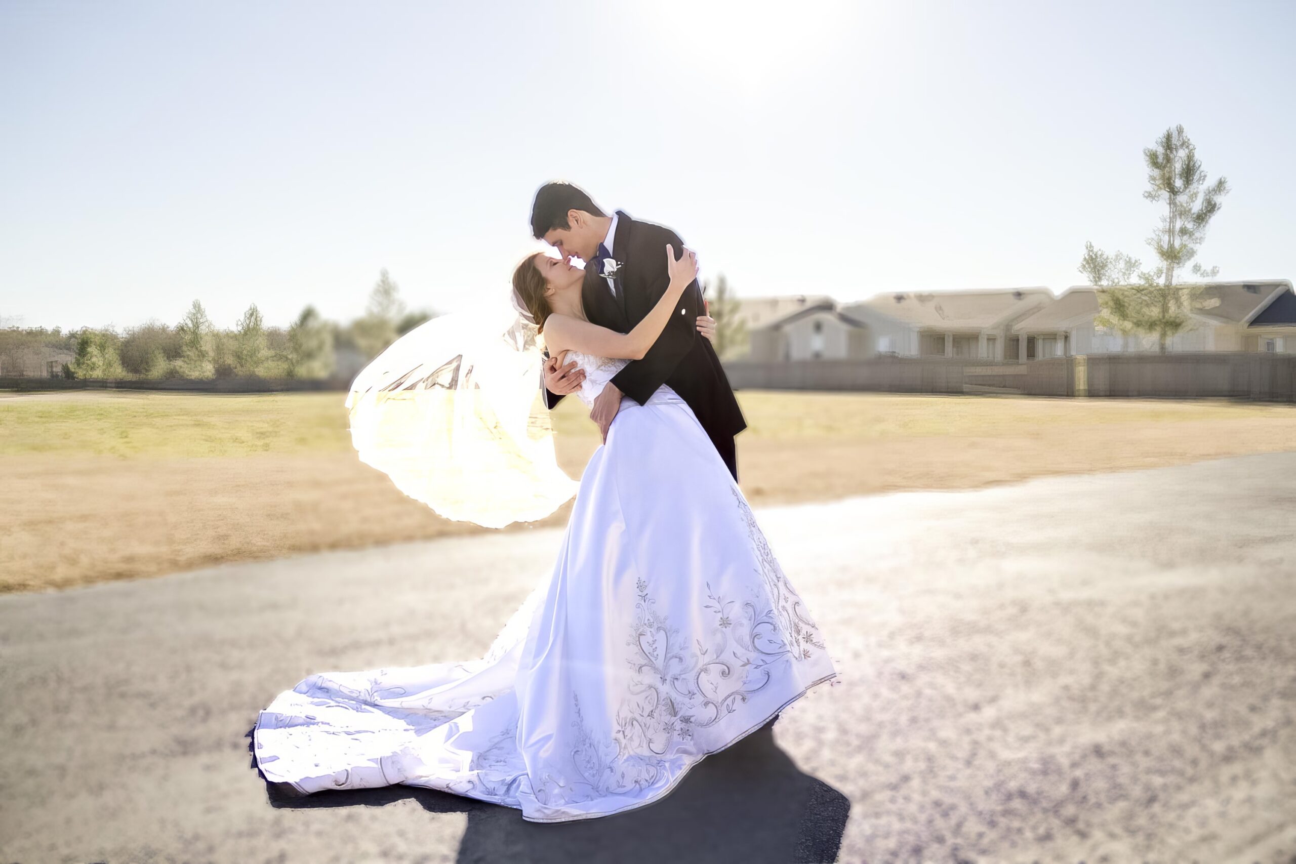 groom dipping bride to give her a kiss in Shreveport, LA