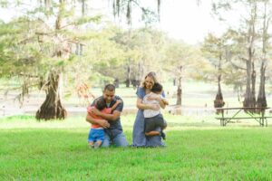 kids and parents embracing each other at Lake Bistineau in Doyline, LA