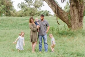 kids running around mommy and daddy as parents stare at them at Red River Wildlife Refuge Center in Bossier City, LA